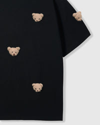 Detail of body and sleeve on STICKYZOO black Bear T-Shirt showing plush bears at different angles