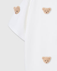 Detail of body and sleeve on STICKYZOO white Bear T-Shirt showing plush bears at different angles
