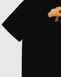 Detail of sleeve and side on STICKYZOO black Runaway Croissant T-Shirt showing boxy construction