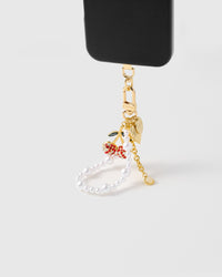 Pearl orbit phone strap hanging from black phone case showing wrist carry functionality