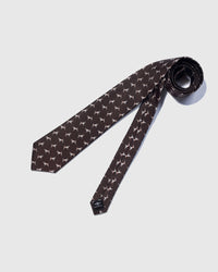 Designed in Amsterdam Pointer Tie knot close-up showing embroidered pointer dog detail on dark brown mulberry silk