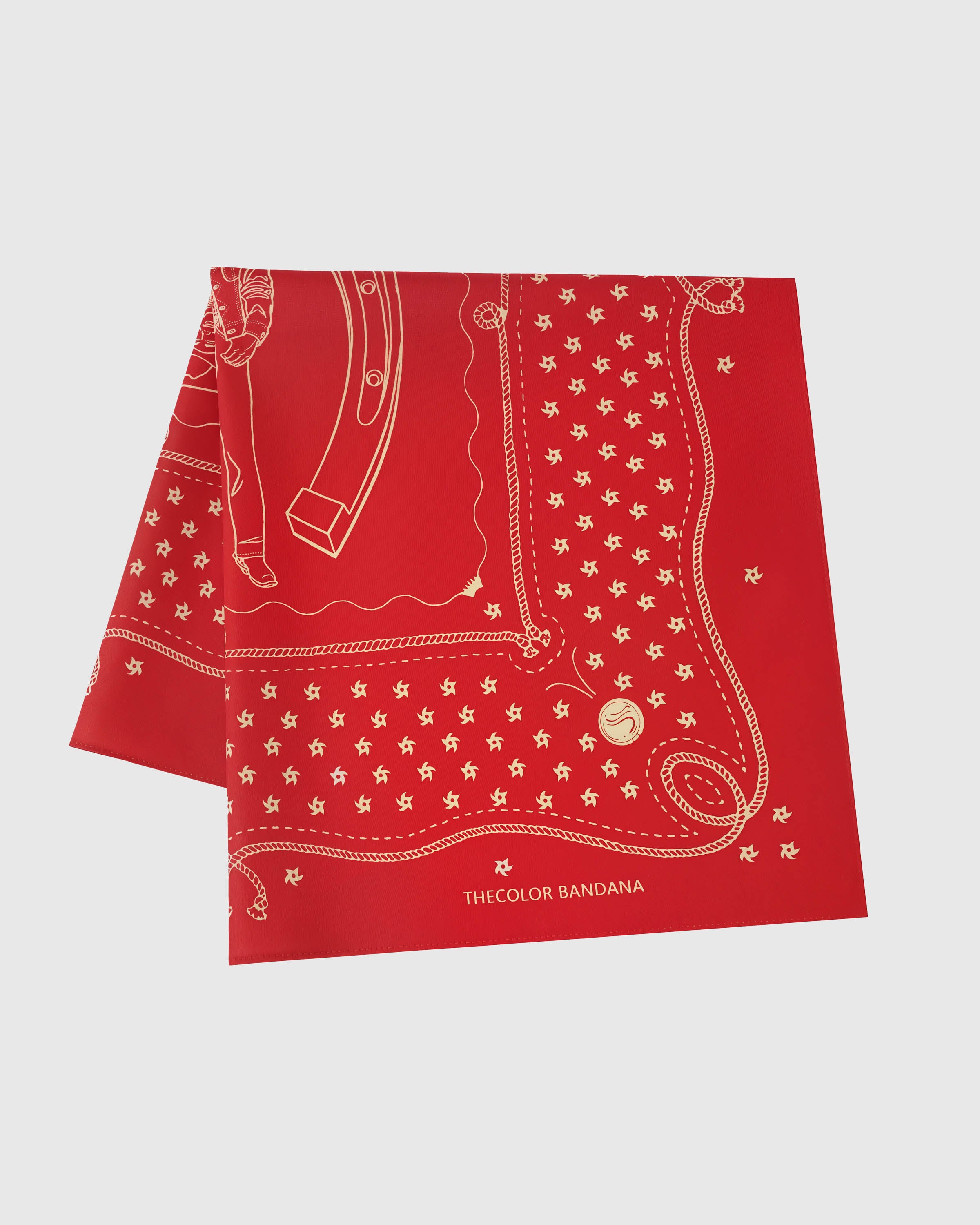 STICKYZOO crimson horseshoe silk scarf folded flat showing the cowboy-and-horseshoe motif