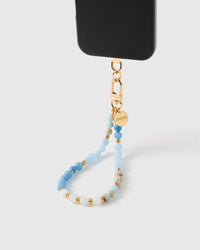 Azure agate orbit phone strap attached to black case showing wrist carry functionality