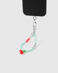 Cherry RRR phone strap hanging from black phone case showing wrist carry functionality