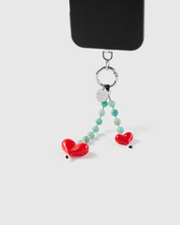 STICKYZOO Jade Heart phone strap with two bead strands hanging from black phone case