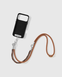 Detail of the caramel cord and braided accent on the STICKYZOO cross-body phone strap
