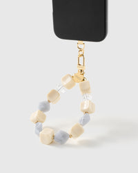 Frost marbled bead wrist strap clipped to a black phone case for hands-free carry