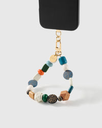 Safari mixed bead wrist strap clipped to a black phone case for hands-free carry