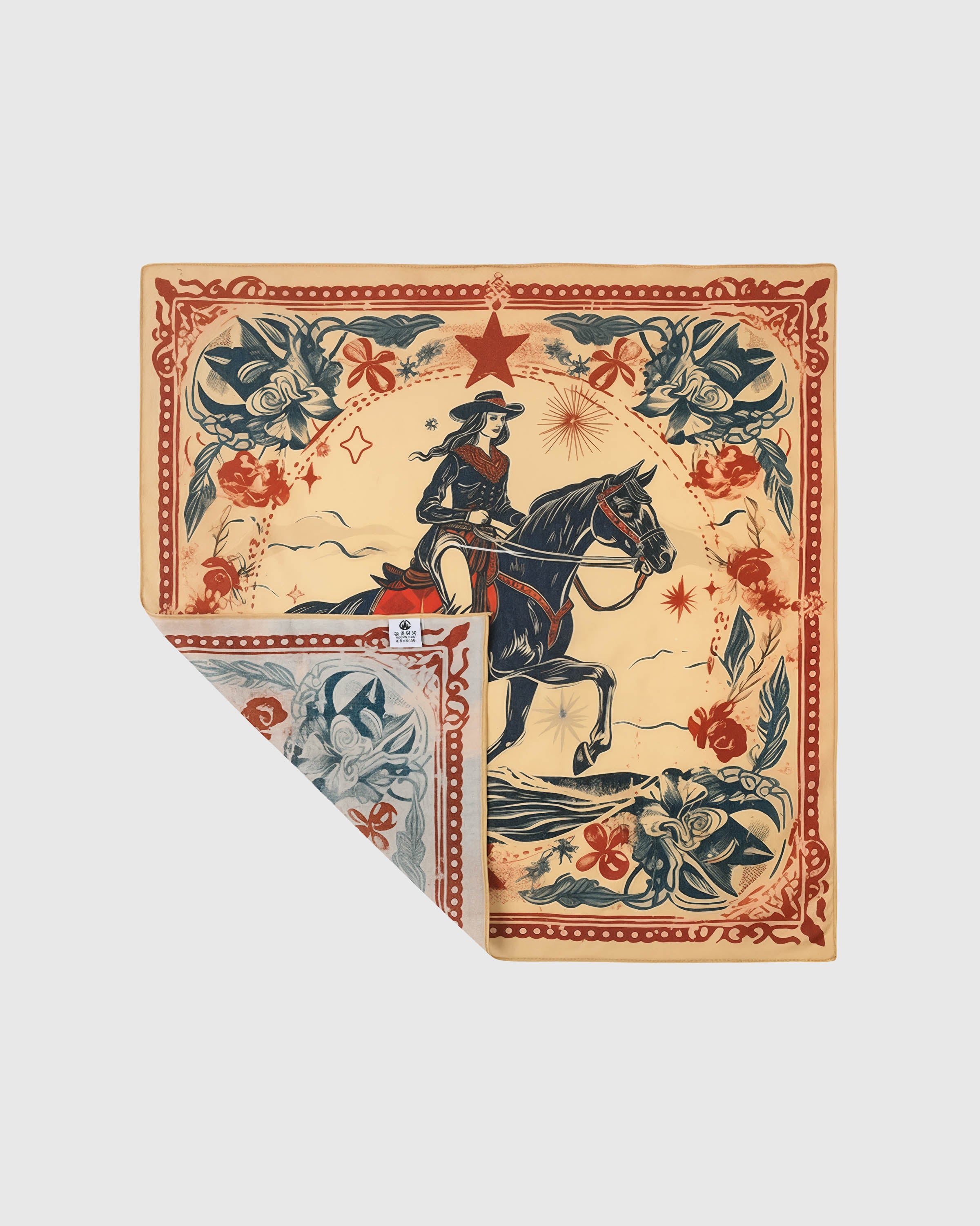 STICKYZOO cowgirl silk scarf folded back to show the printed rider motif and the soft silk reverse