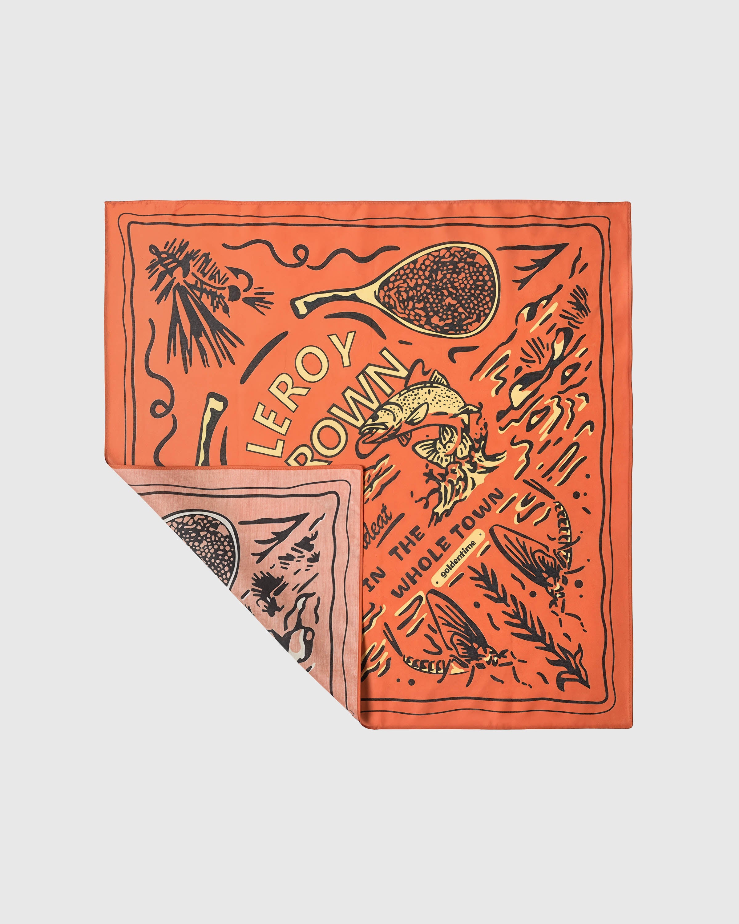 STICKYZOO fly-fishing silk scarf folded back to show the printed trout motif and the soft silk reverse