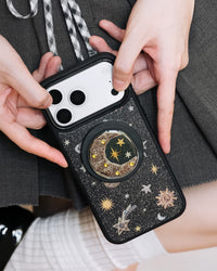Back of the STICKYZOO beaded moon phone case showing the full celestial print and central beaded grip