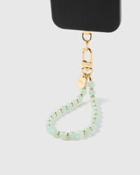STICKYZOO Mint Bead phone strap attached to black phone case showing soft green stone beads