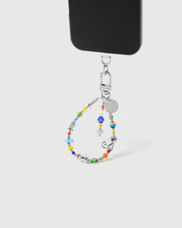 Rainbow glass bead phone strap hanging from black phone case in daily carry position