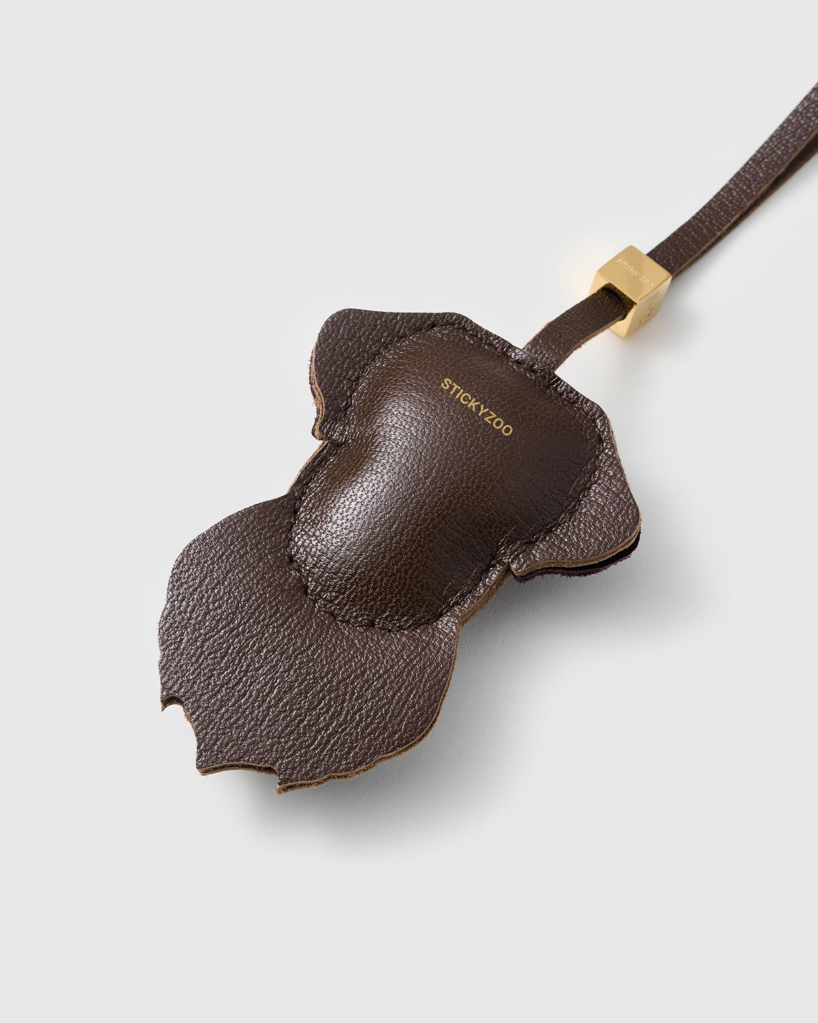 {{Loved by thousands.}} Labrador Retriever charm styled on a bag, front — loved by thousands of Labrador Retriever people. Real French leather, 3 days by hand.