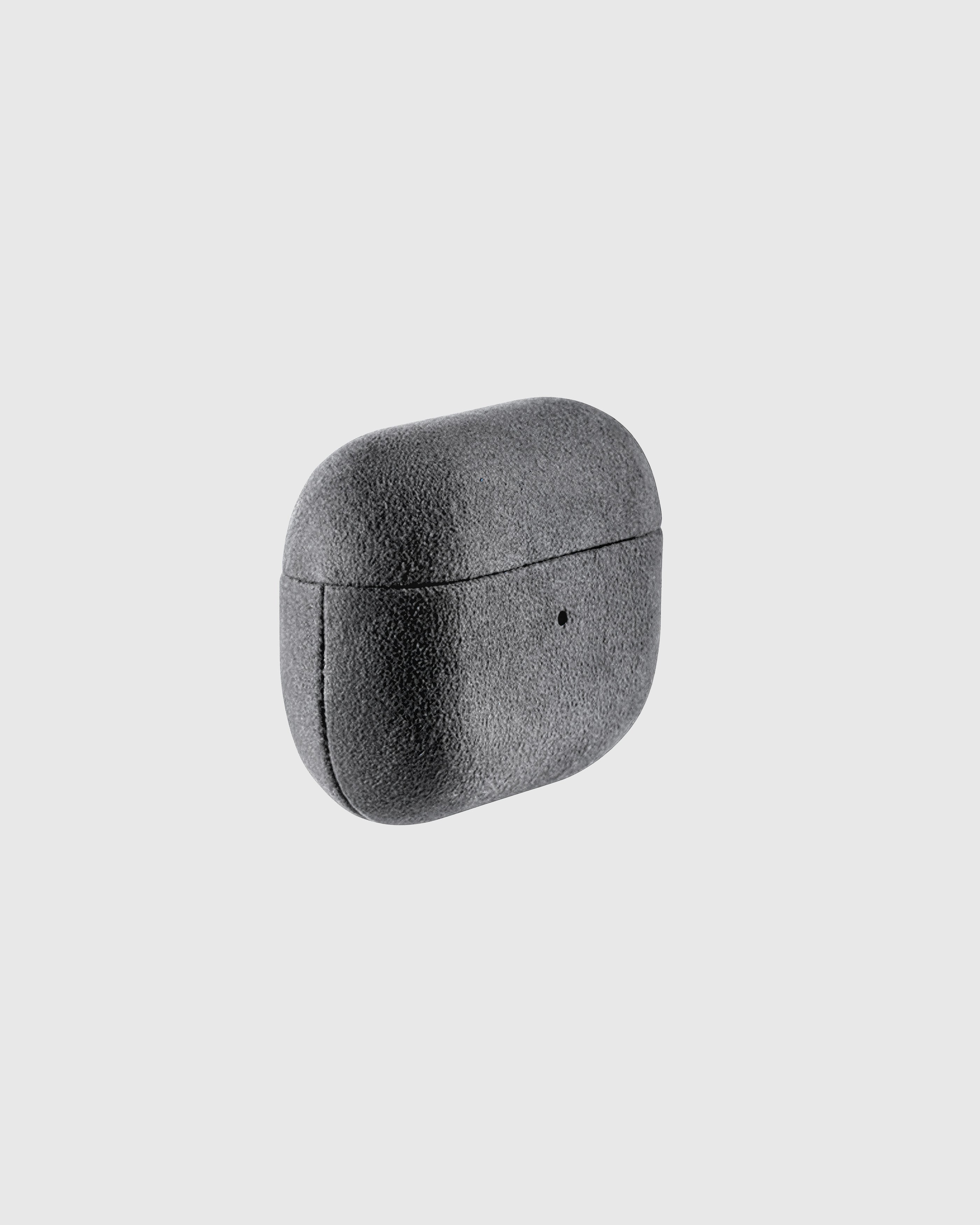 Back view of charcoal Alcantara case showing USB-C port and speaker cutouts