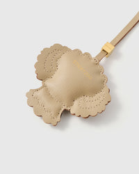 smooth French Alran goatskin with gold STICKYZOO embossing. Scalloped edge stitching. 72 hours of handcraft.