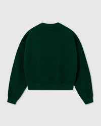Back view of STICKYZOO Saint Teddy Bear Sweatshirt in forest green showing dropped shoulder seam and construction