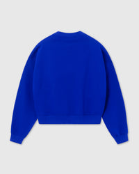 Back view of STICKYZOO Saint Teddy Bear Sweatshirt in blue showing clean construction