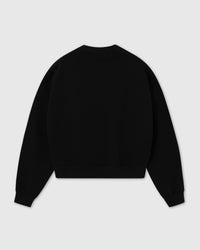 Back view of STICKYZOO Saint Teddy Bear Sweatshirt in black showing dropped shoulder seam and clean construction