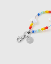 Close-up of silver-tone clasp and engraved STICKYZOO charm disc with rainbow beads and cloud charm