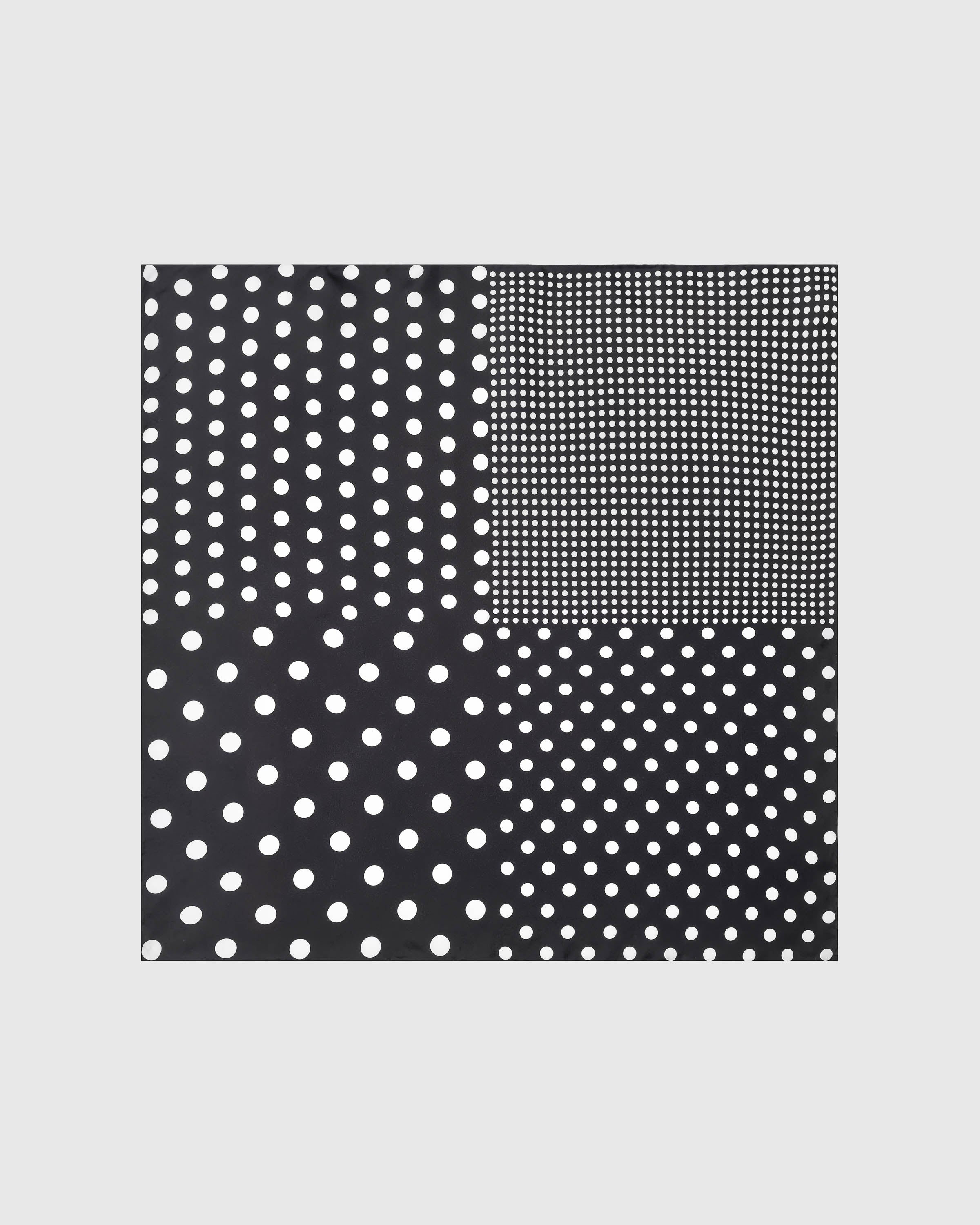 Noir polka study silk scarf with four scales of hand-illustrated white dots on a black field by STICKYZOO