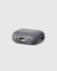 Back view of ash grey Alcantara case showing USB-C port and speaker cutouts