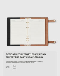 STICKYZOO A5 notebook open flat showing lined pages, designed for effortless writing, planning, and daily use