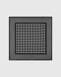 Midnight dot silk scarf with a two-scale white polka dot print on a jet black field by STICKYZOO