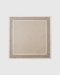 Horseshoe luck silk scarf with hand-illustrated charcoal horseshoes scattered on an ivory field by STICKYZOO