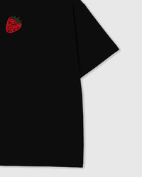 Styled layflat of 230gsm cool-touch cotton with the hand-beaded glass strawberry on the black STICKYZOO tee.