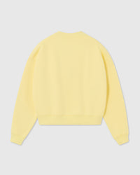 Back view of STICKYZOO Saint Teddy Bear Sweatshirt in lemon showing clean construction