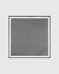 Chain link grid silk scarf corner detail showing the ivory band and the chain motif by STICKYZOO