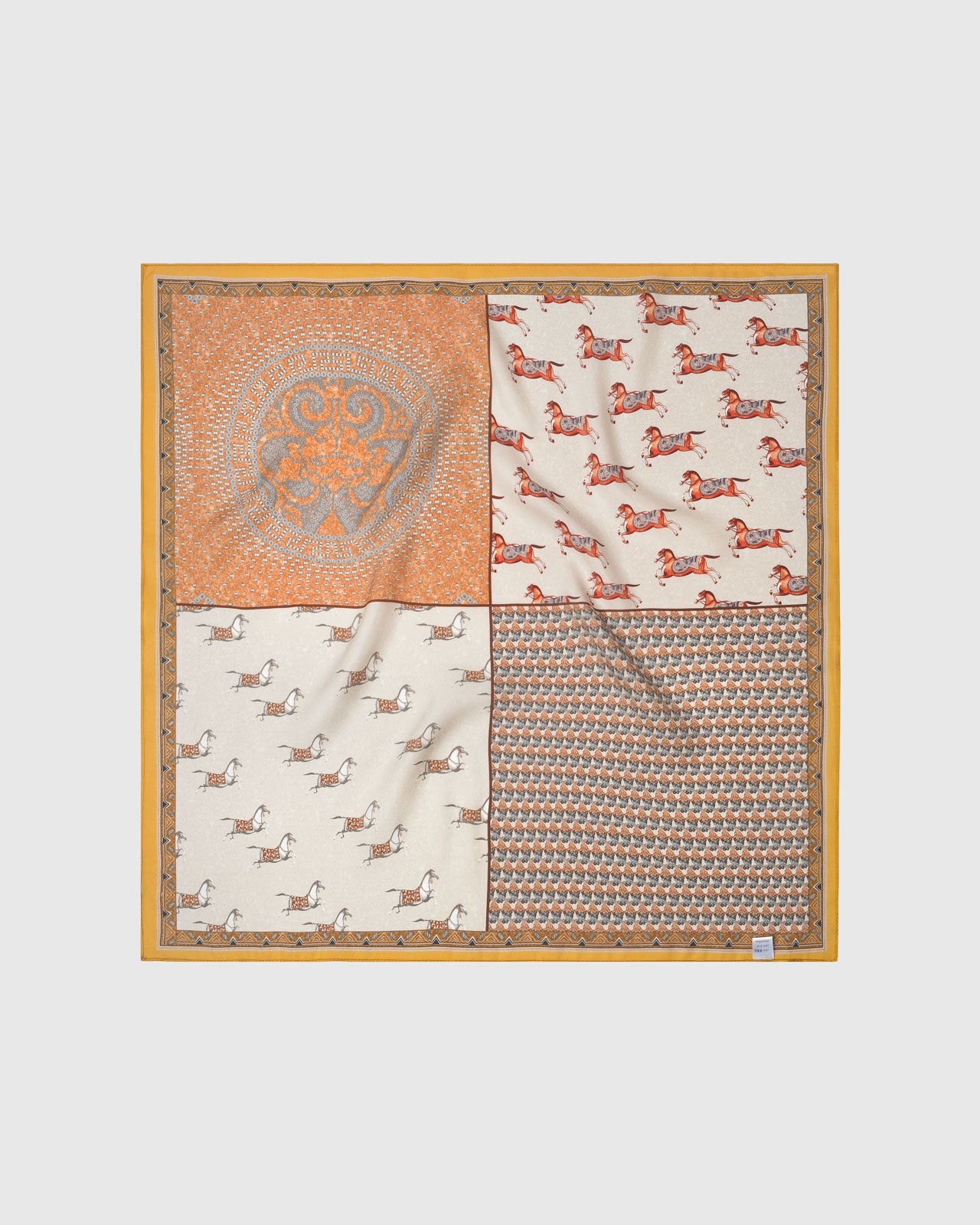 Gallop patchwork silk scarf swirled to show the rust horses on ivory and the terracotta panel by STICKYZOO