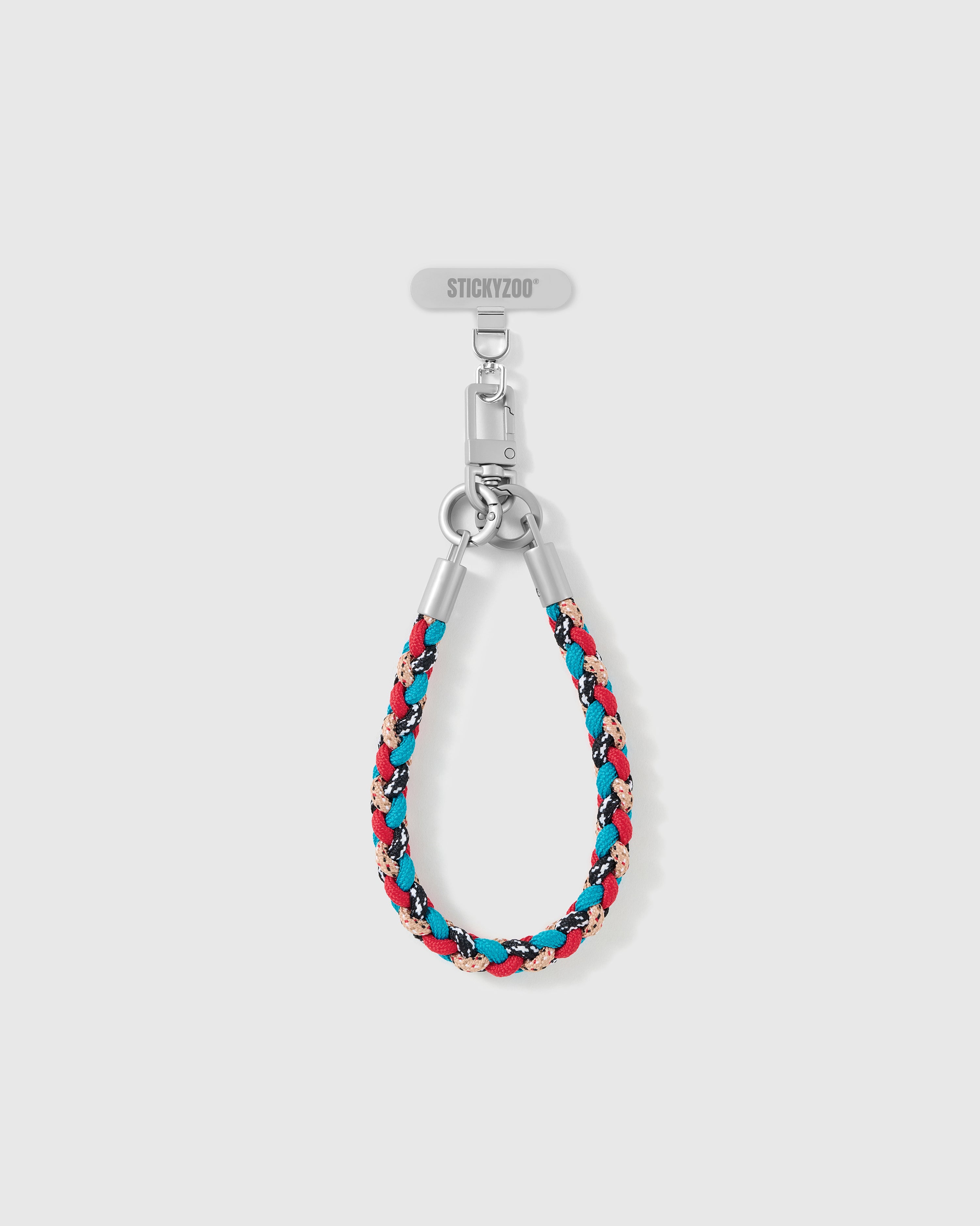 Scarlet strap looped short as a wrist strap, showing the teal and black braided cord and silver-tone hardware