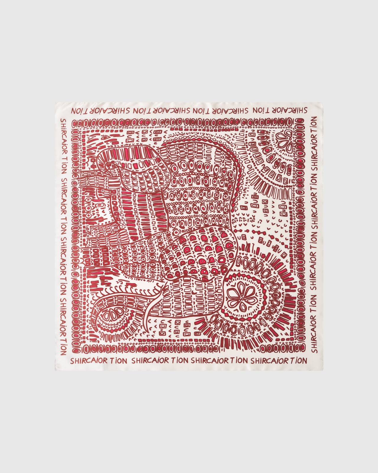 Crimson folklore silk scarf with hand-illustrated folk motif and magenta accents on a cream field by STICKYZOO