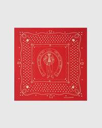 Crimson horseshoe silk scarf with a hand-illustrated cowboy motif and roped border by STICKYZOO