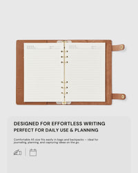 STICKYZOO camel A5 notebook open flat showing lined pages, designed for effortless writing, planning, and daily use