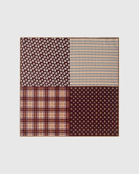 Oxblood patchwork silk scarf with hand-illustrated daisy, houndstooth, plaid, and foulard quadrants by STICKYZOO
