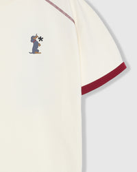 Model wearing STICKYZOO Dachshund Bloom Ringer in cream showing relaxed silhouette and dropped shoulders