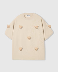 STICKYZOO Bear T-Shirt in beige with seven hand-stitched 3D plush bear face appliques — front flat-lay