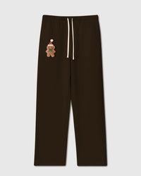 STICKYZOO Gingerbread Joy Sweatpant in dark brown colorway with hand-stitched plush gingerbread man