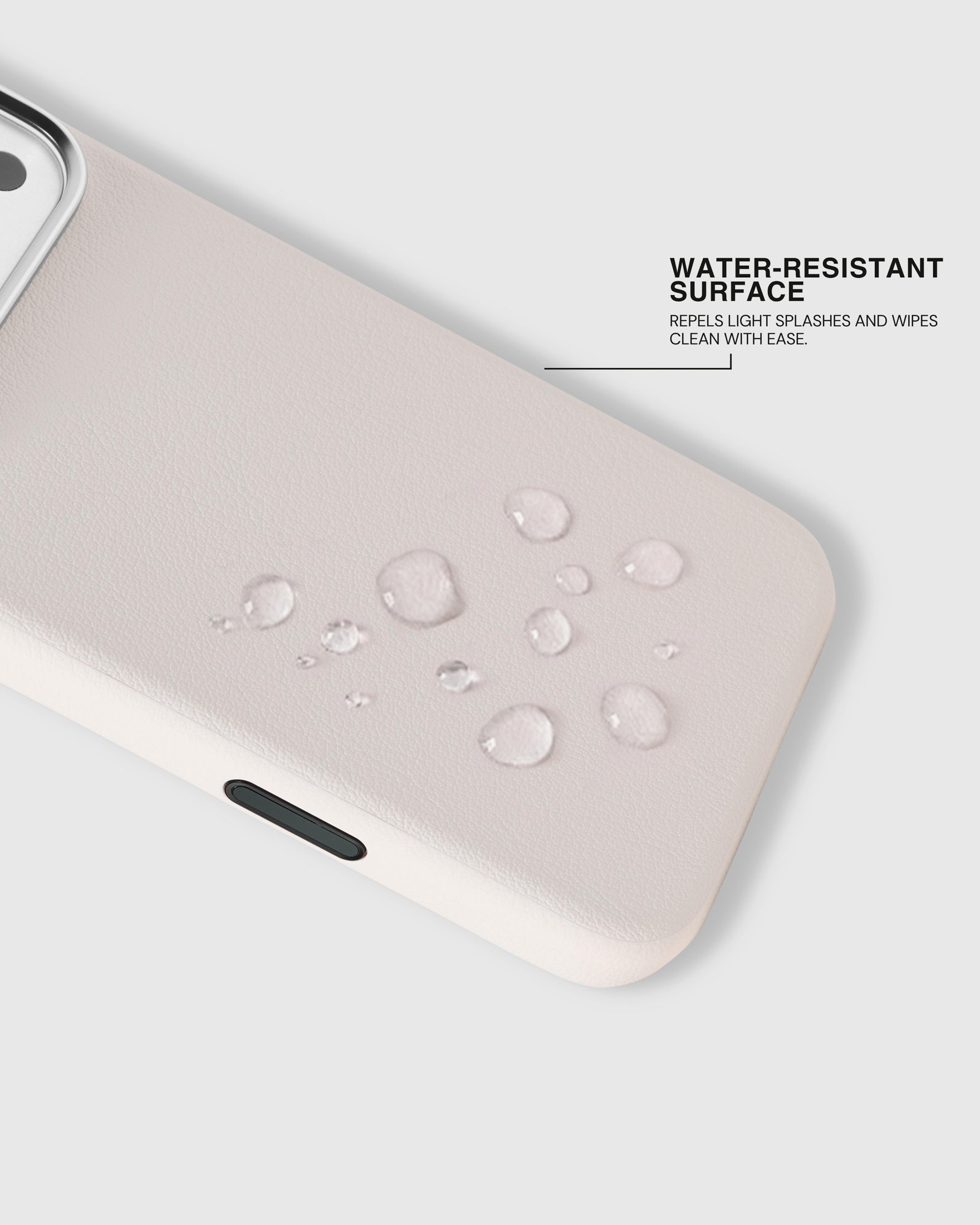 Water beading on the splash-resistant surface of the white STICKYZOO leather phone case