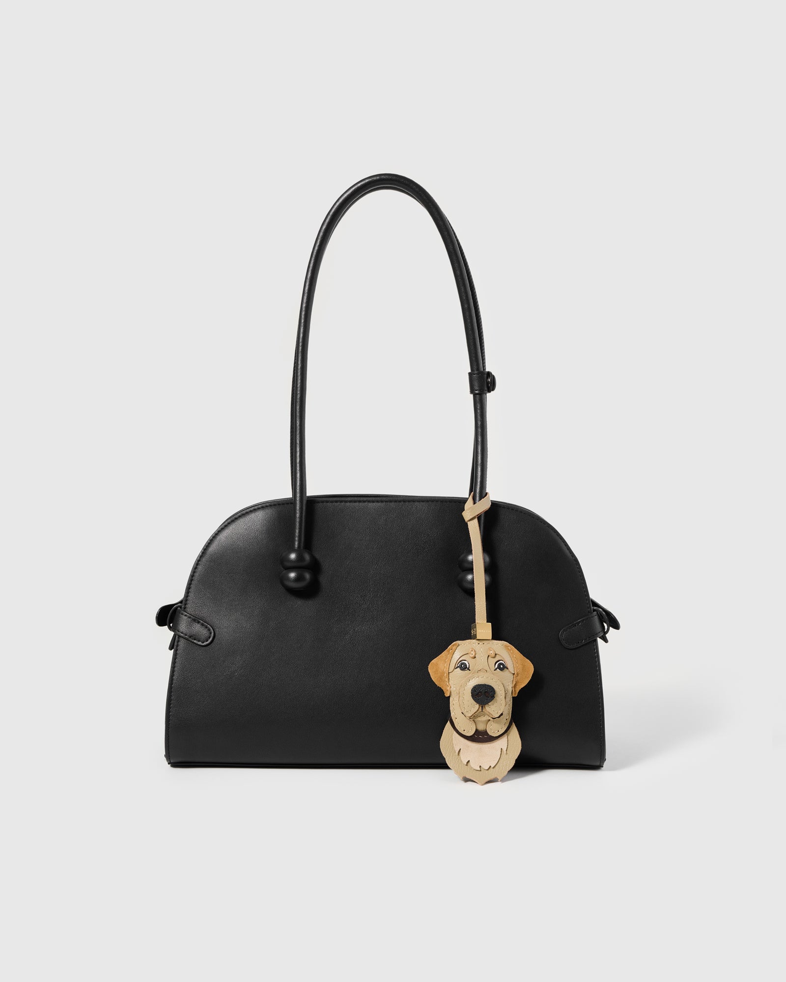 {{Feathered suede chest.}} Detail of the Labrador Retriever — champagne-cream suede chest fur hand-cut into jagged layered edges to simulate the breed's natural coat.