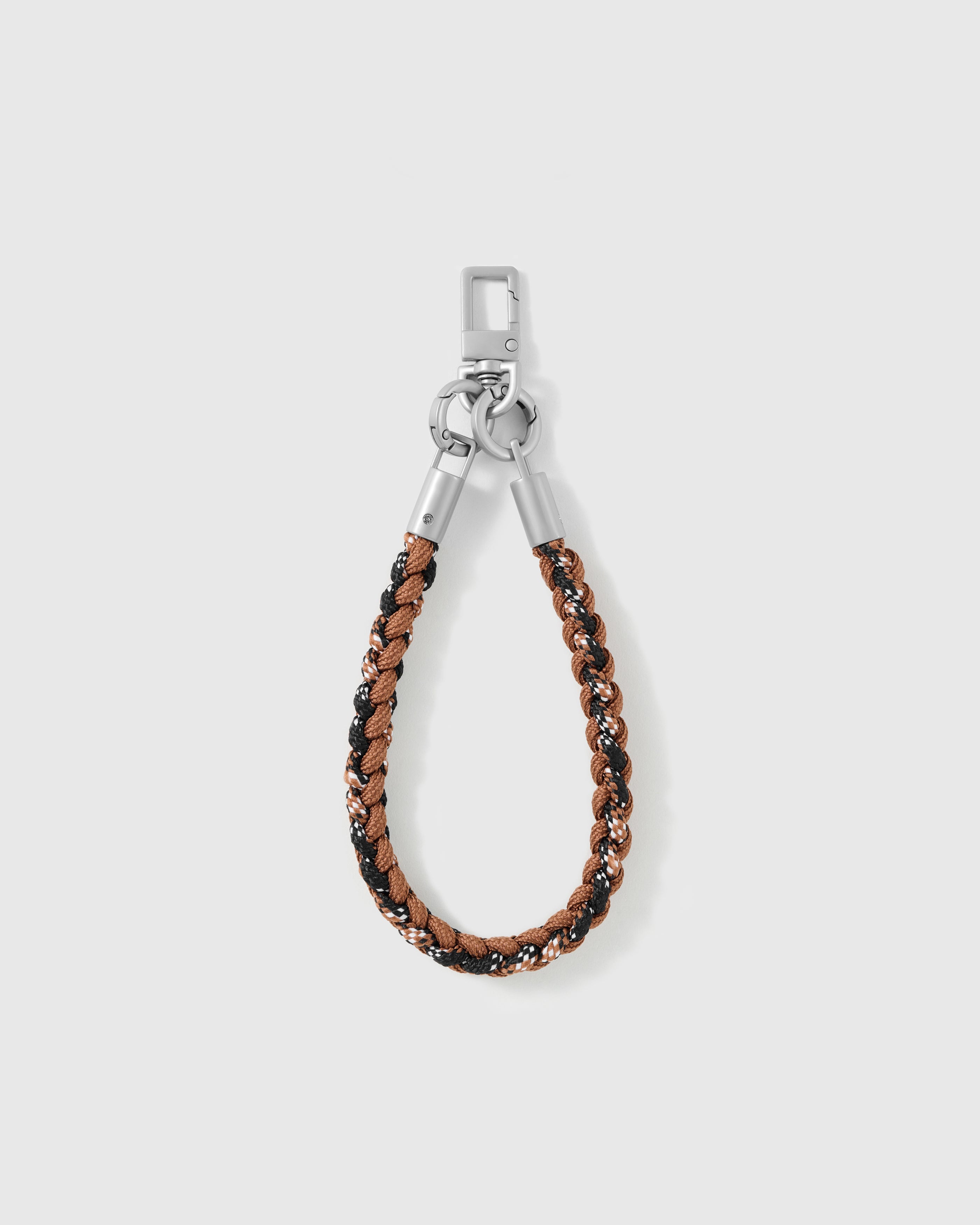 Cross-body phone strap shown with its universal phone-tab connector and safety tether