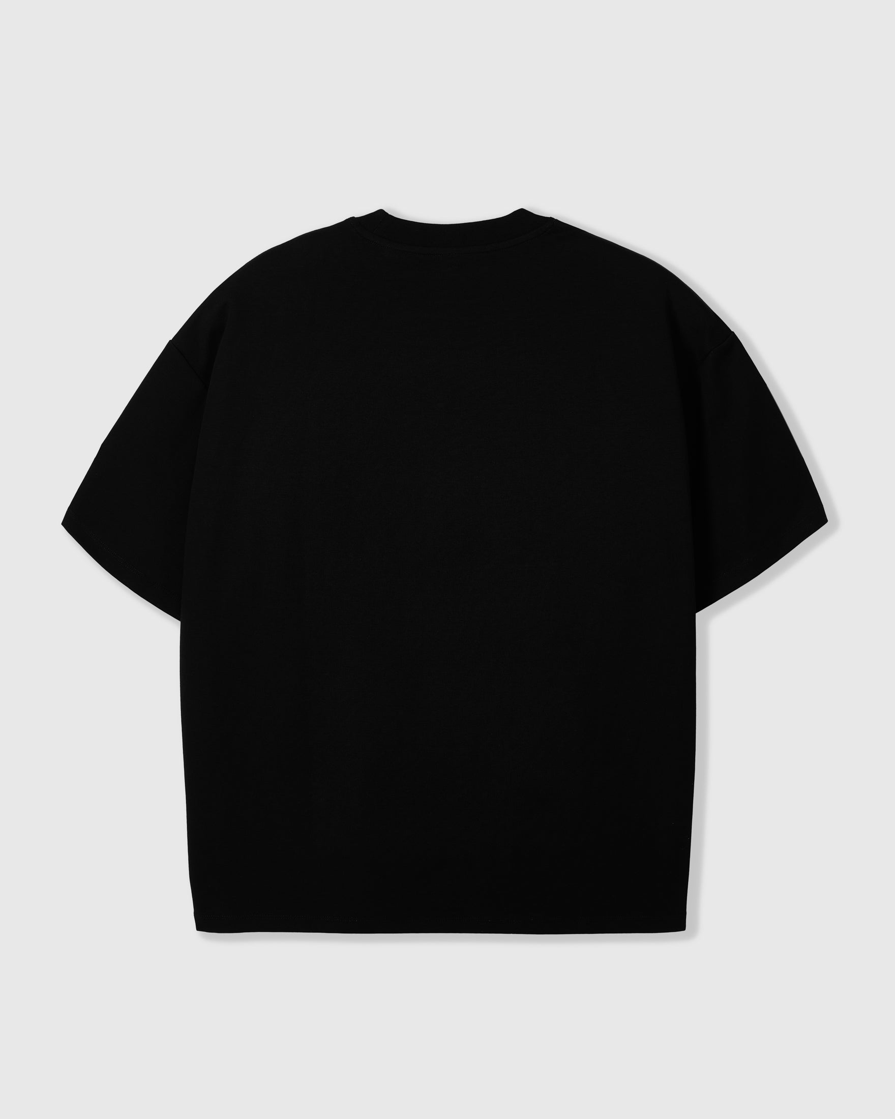 Back view of black Cherry T-Shirt showing oversized boxy proportions and drop shoulder