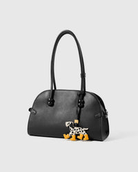 Dalmatian Rain Boots leather bag charm shown in both attachment options — handmade French Alran goatskin, dual attachment. STICKYZOO Amsterdam design.