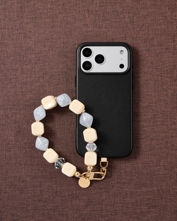 Frost marbled bead phone strap styled on fabric, loved by thousands of STICKYZOO customers