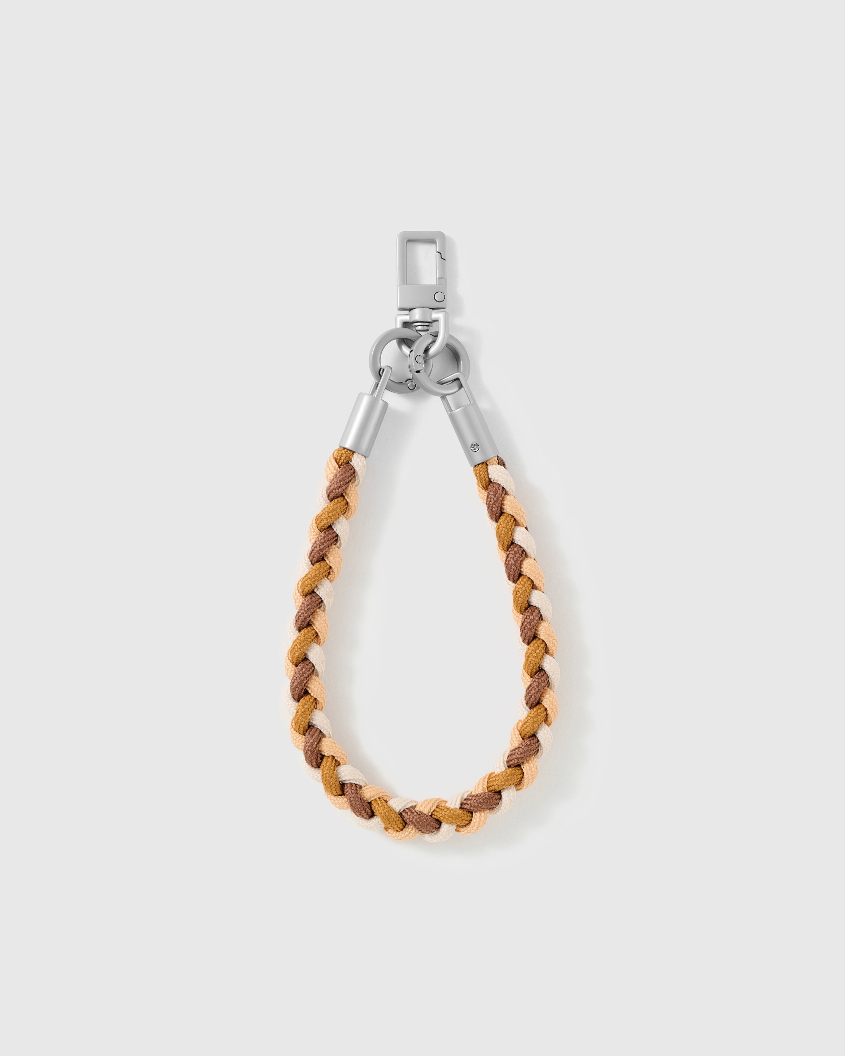 Detail of the two-tone caramel and cream braided cord and silver-tone hardware, loved by thousands of STICKYZOO customers