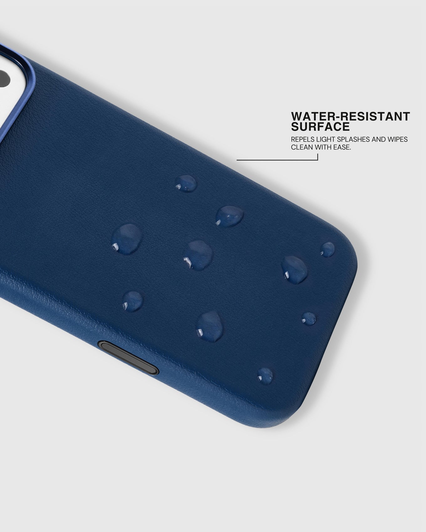 Water beading on the splash-resistant surface of the navy STICKYZOO leather phone case