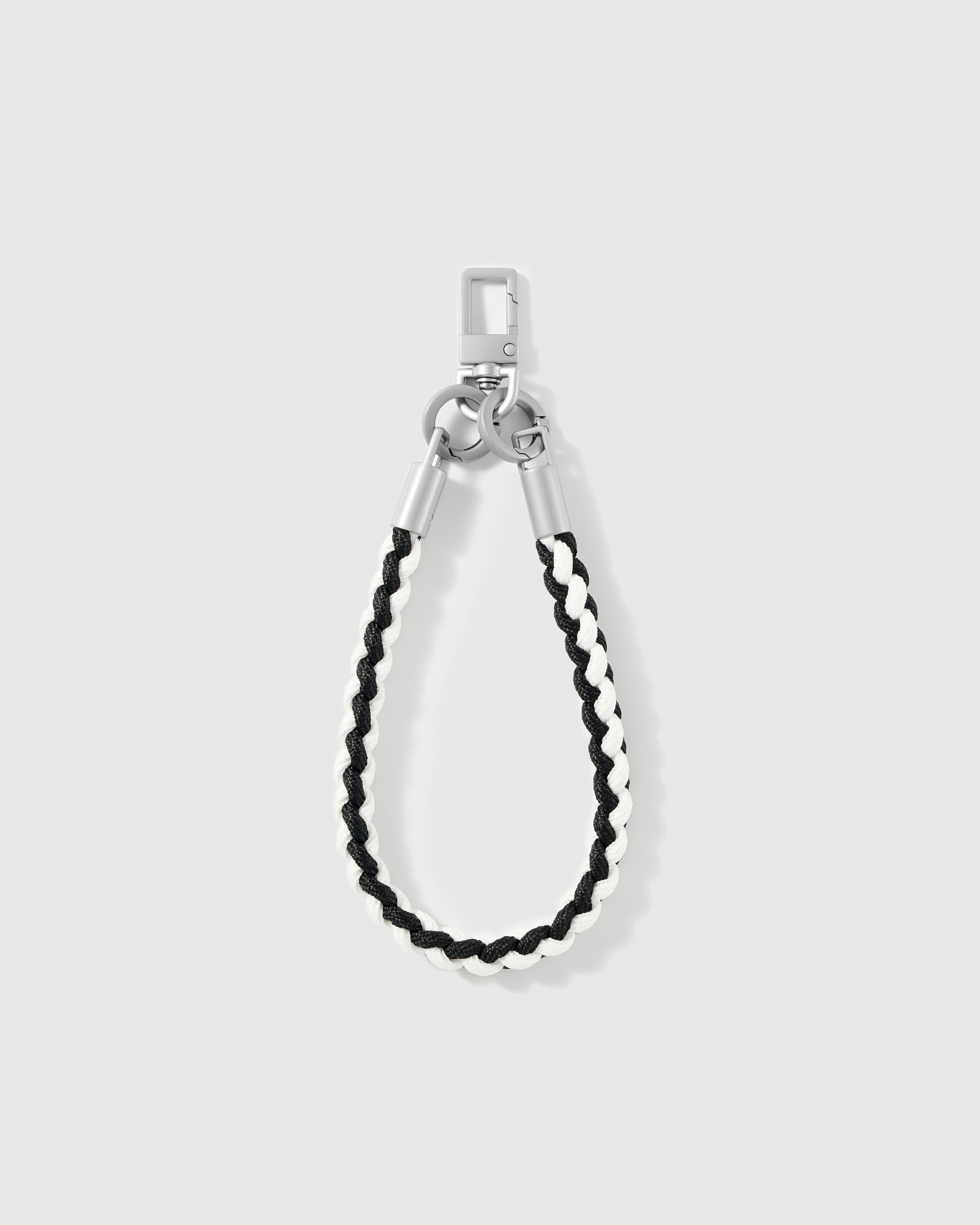 Detail of the two-tone black and cream braided cord and silver-tone hardware, loved by thousands of STICKYZOO customers